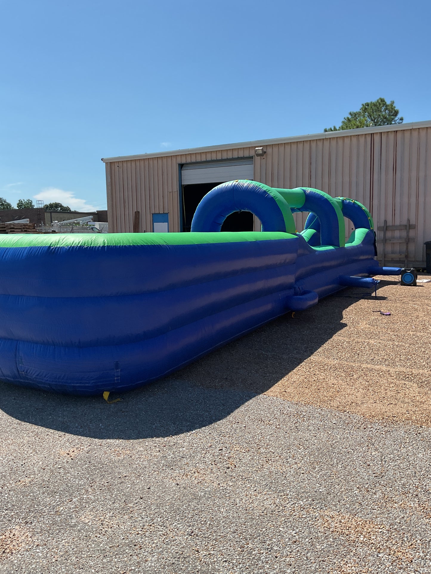 Green Blue Slip-n-Slide with pool and landing attachment