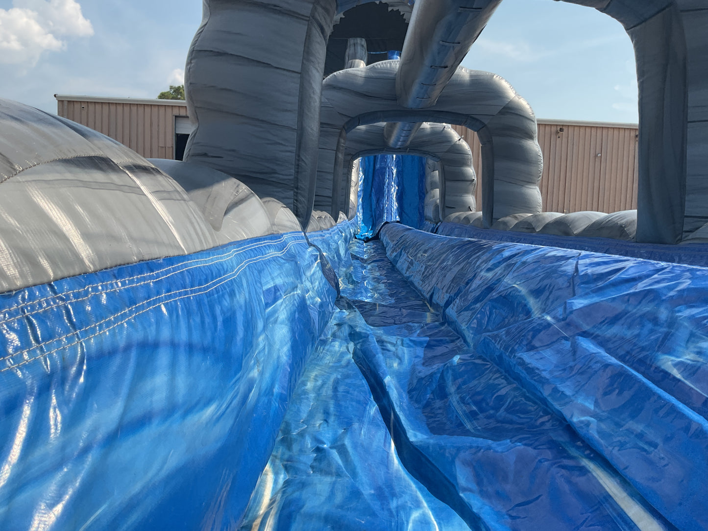 27' Roaring River Dual Lane Slide with slip-n-slide landing attachment