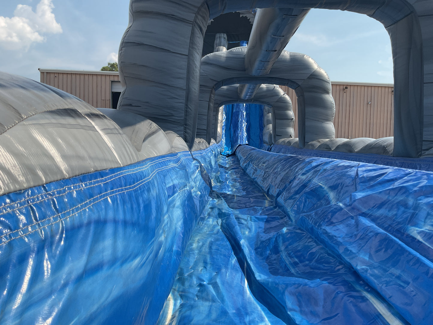 27' Roaring River Dual Lane Slide with slip-n-slide landing attachment