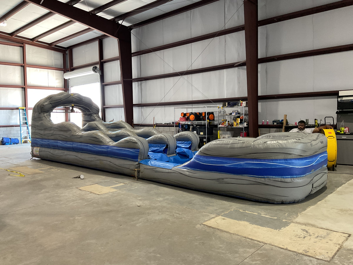 Dual Lane Slip-n-Slide with pool and landing attachments