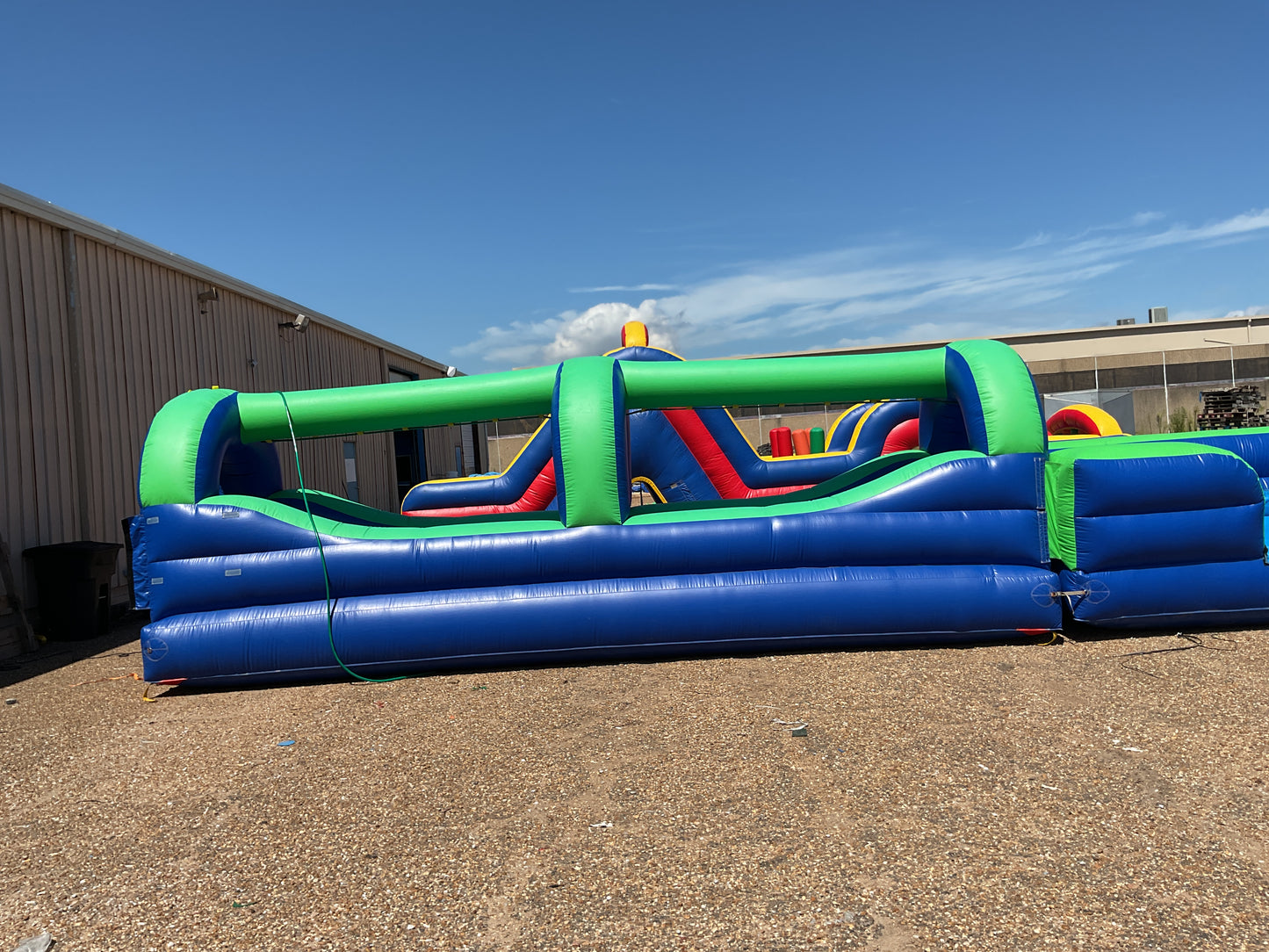 Green Blue Slip-n-Slide with pool and landing attachment