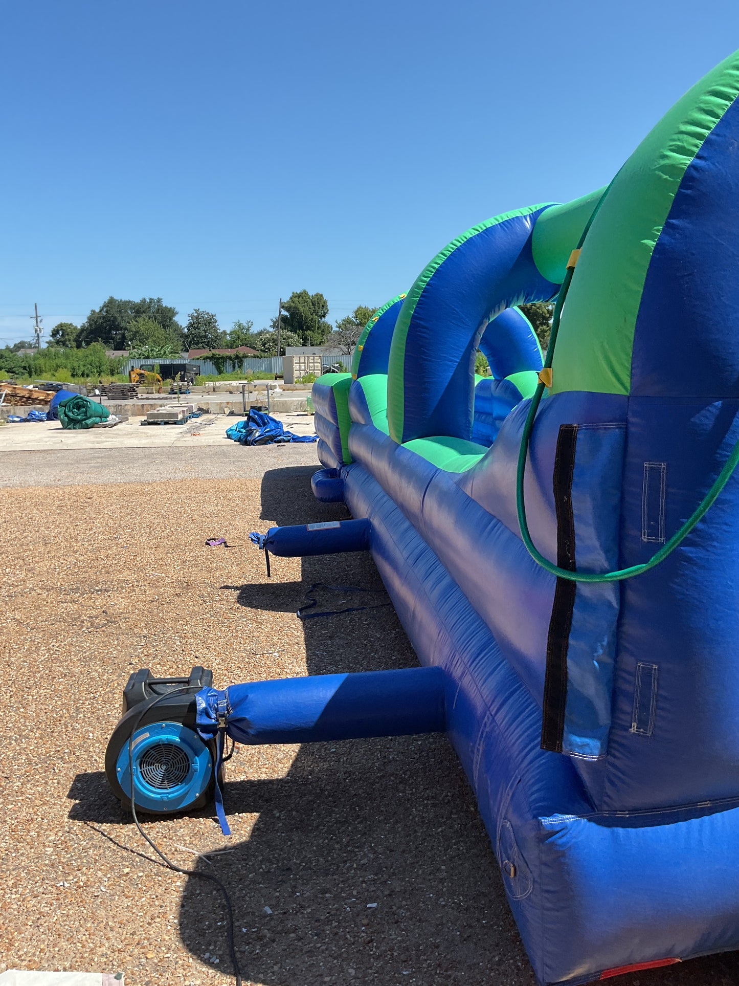 Green Blue Slip-n-Slide with pool and landing attachment