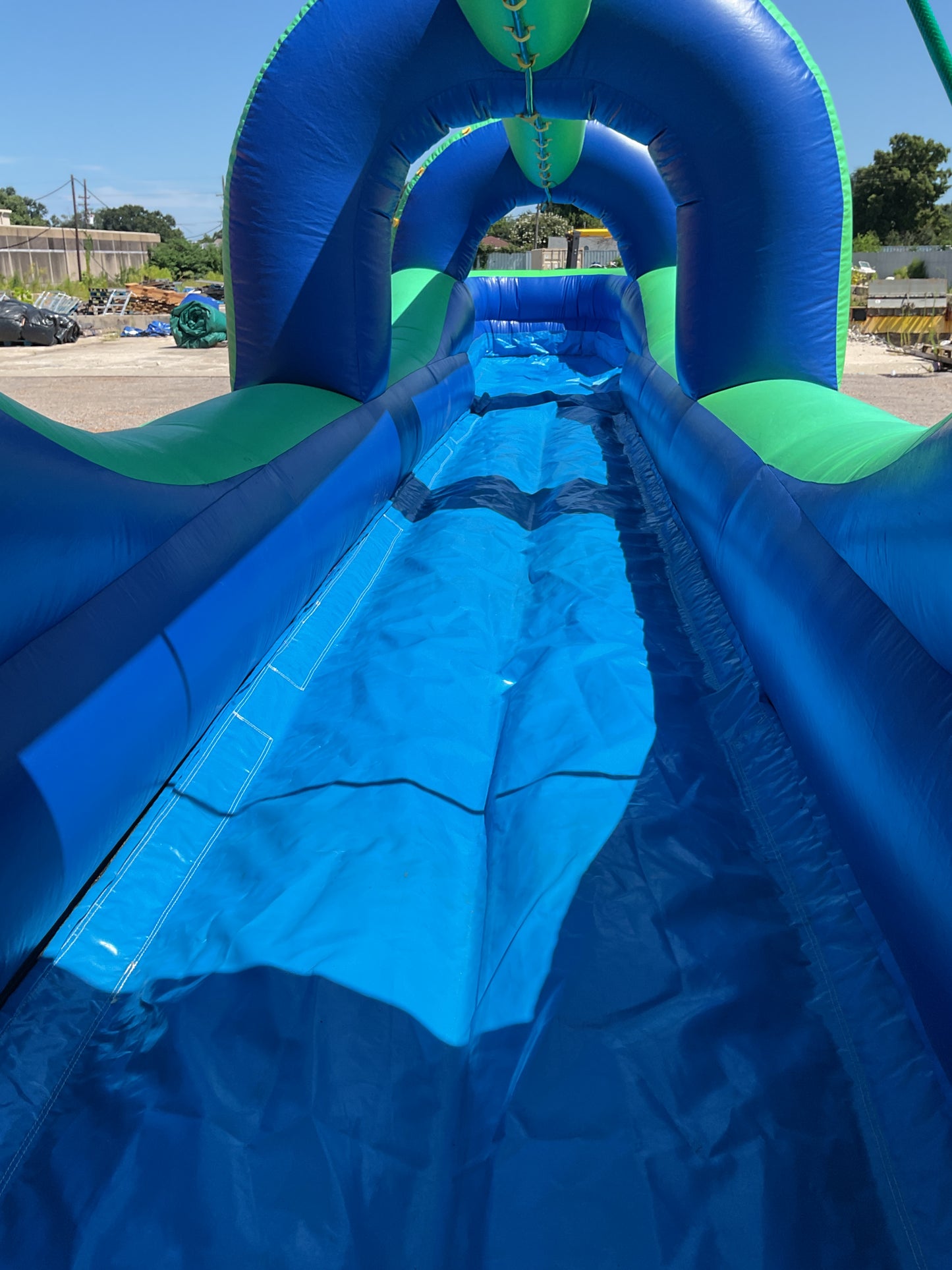 Green Blue Slip-n-Slide with pool and landing attachment