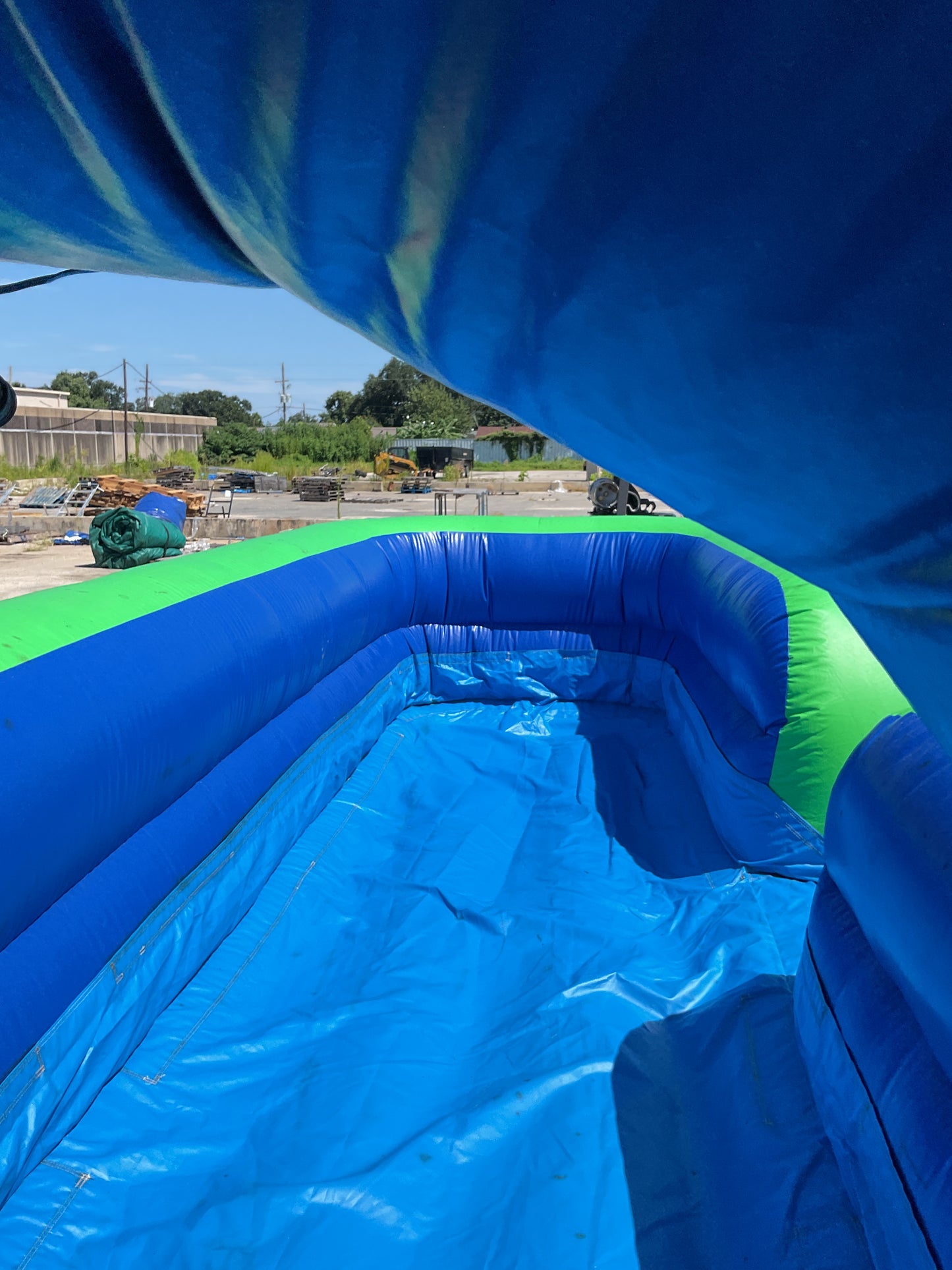 Green Blue Slip-n-Slide with pool and landing attachment