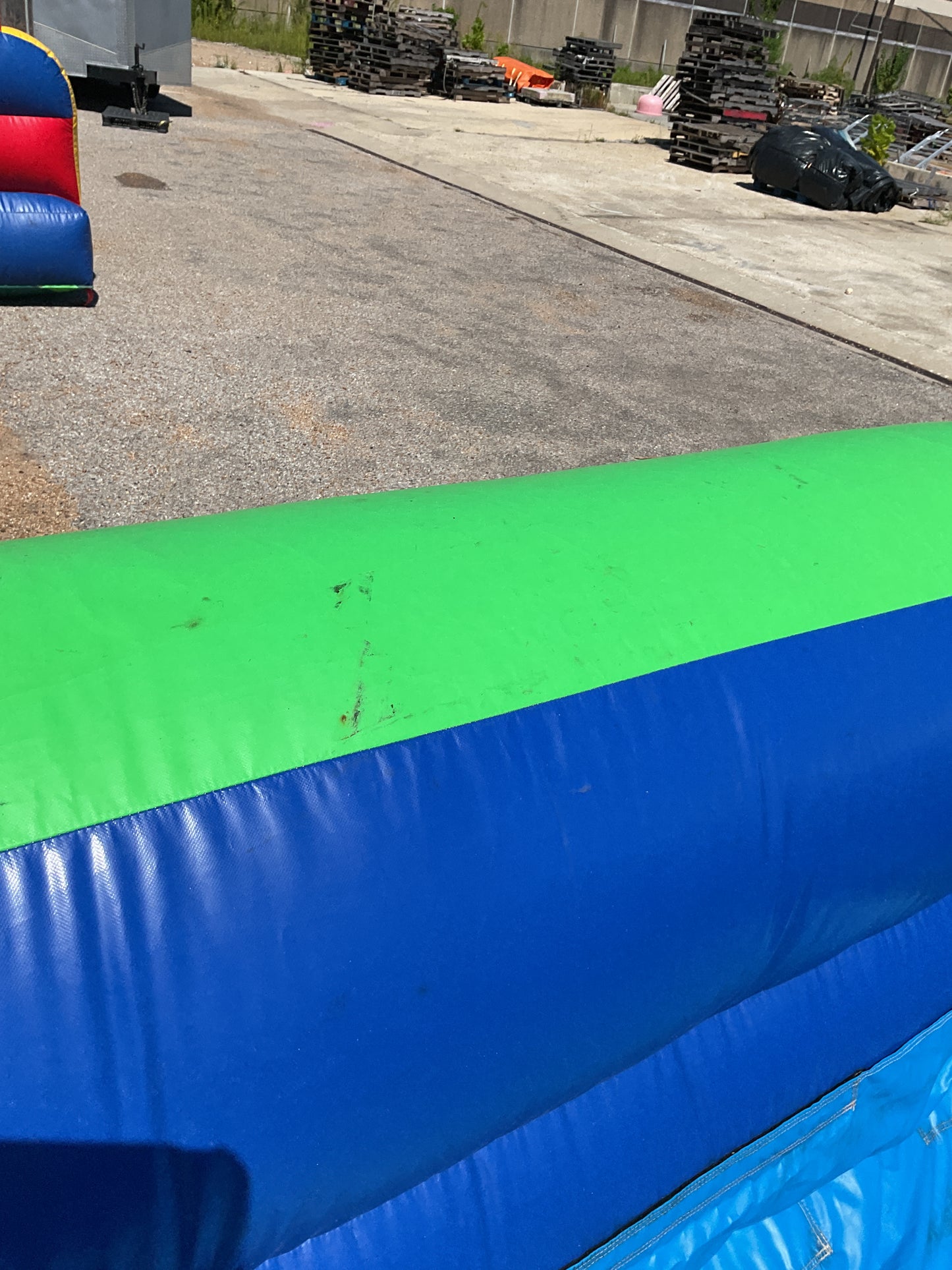Green Blue Slip-n-Slide with pool and landing attachment