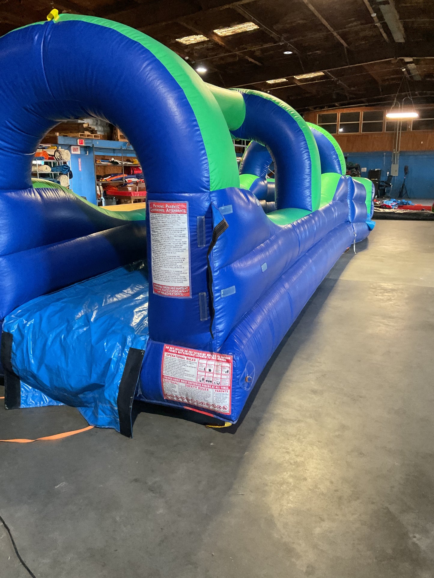 Green Blue Slip-n-Slide with pool and landing attachment