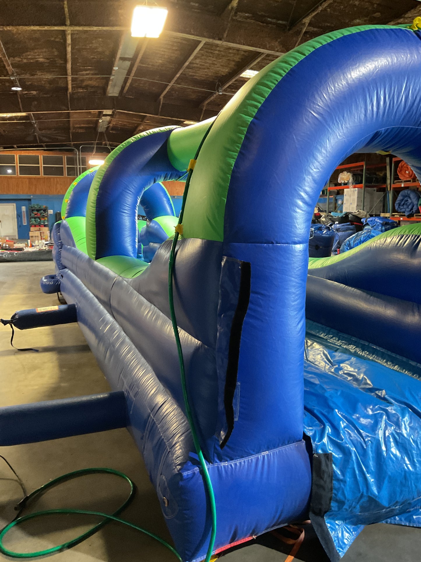 Green Blue Slip-n-Slide with pool and landing attachment
