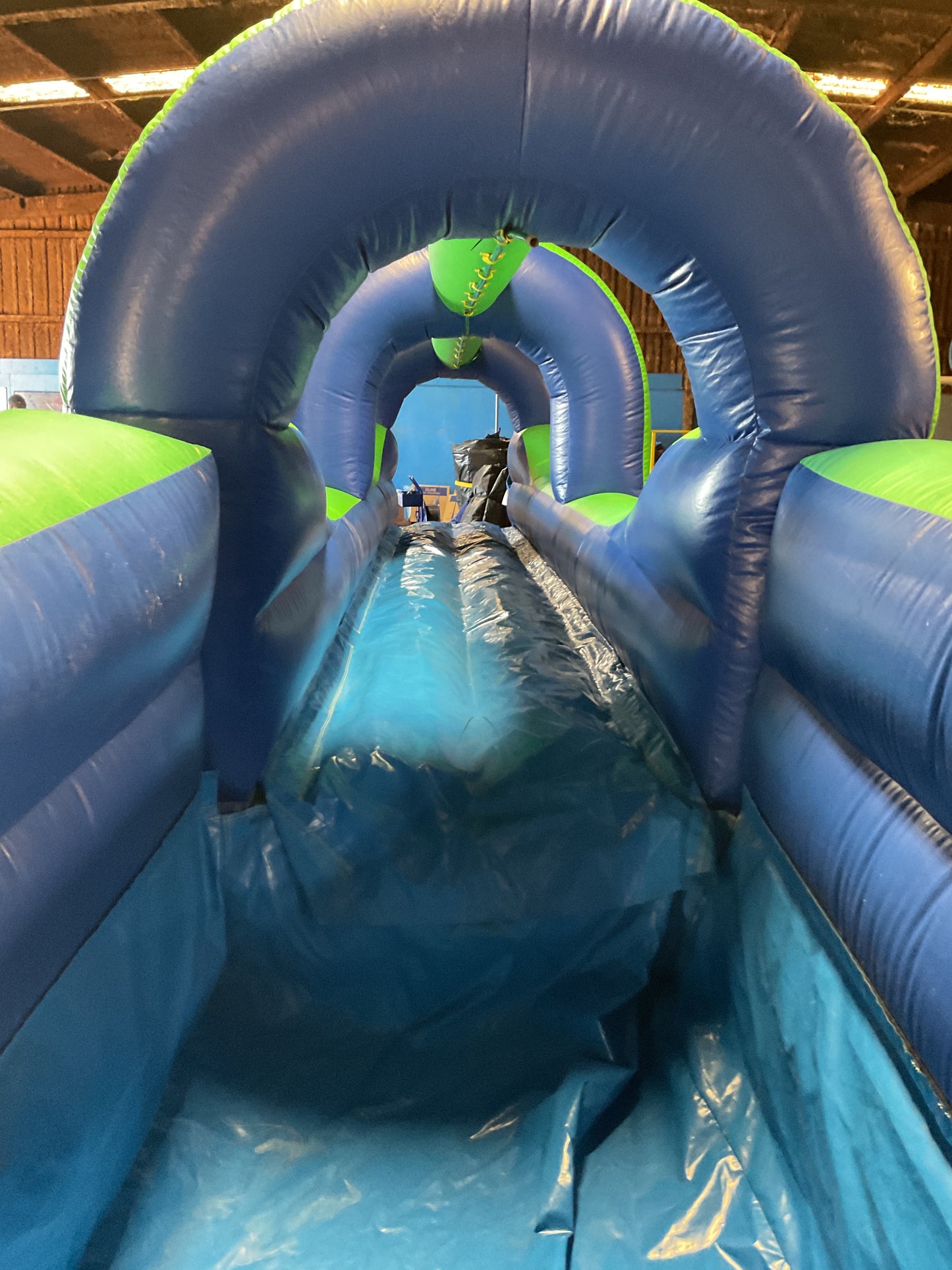 Green Blue Slip-n-Slide with pool and landing attachment