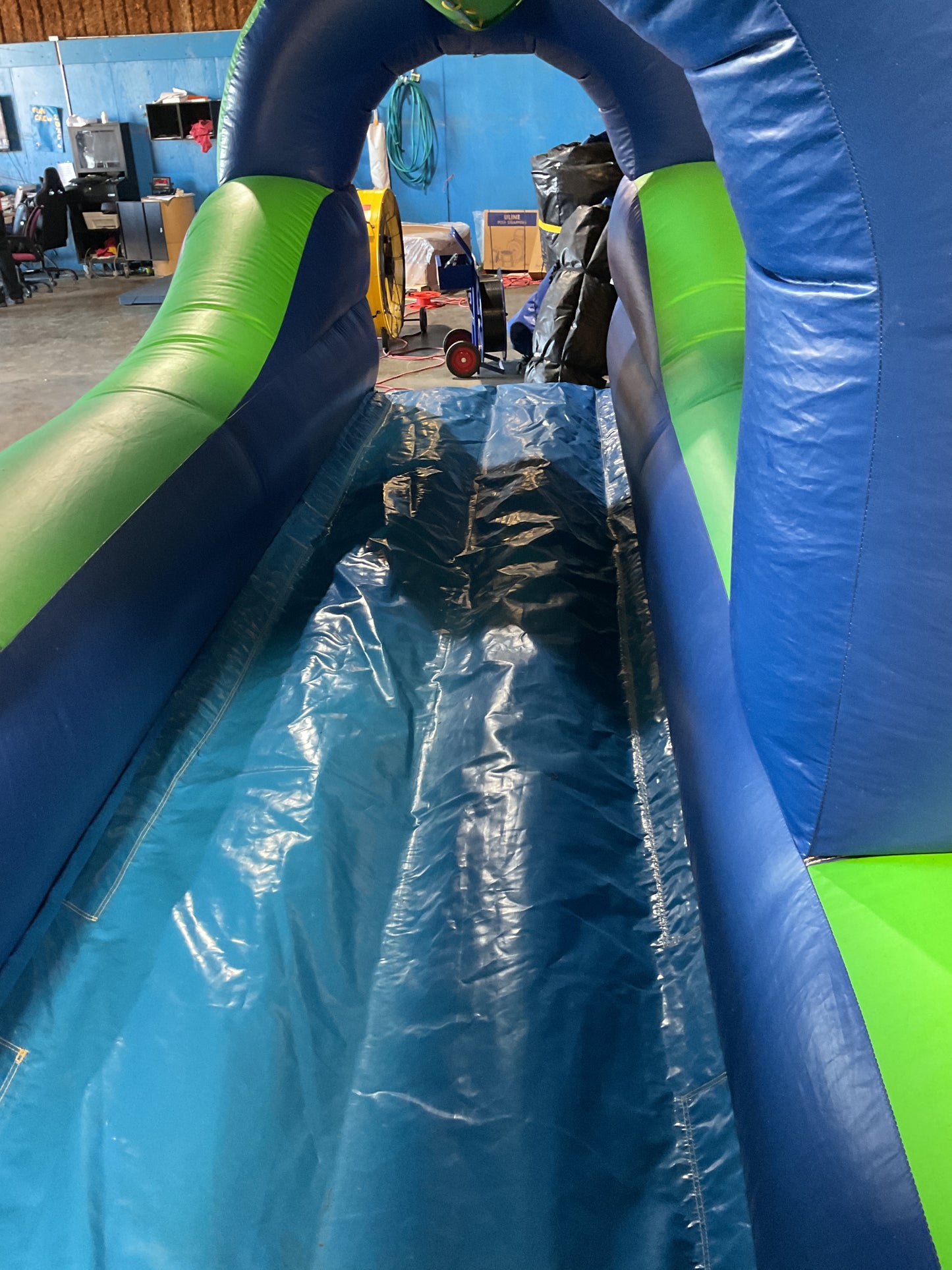 Green Blue Slip-n-Slide with pool and landing attachment