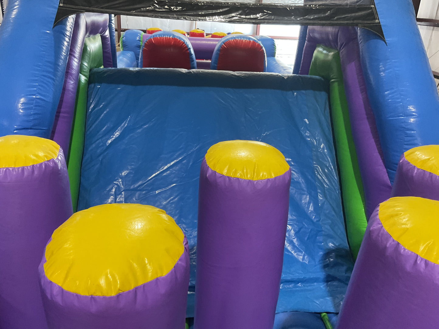 70' Obstacle Course (40' obstacle + 30' Rock climb slide)